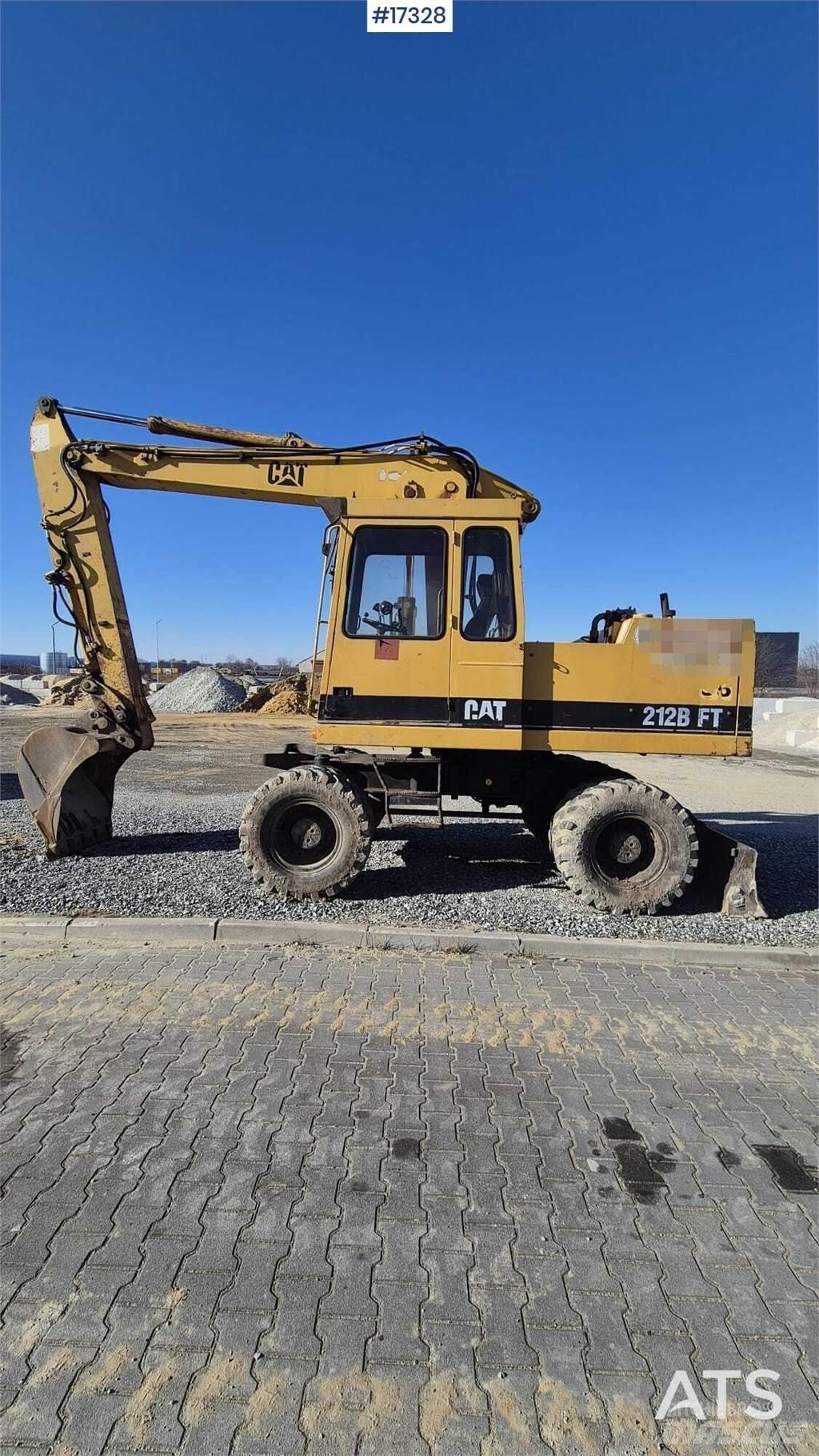 CAT 212BFT Колісні екскаватори