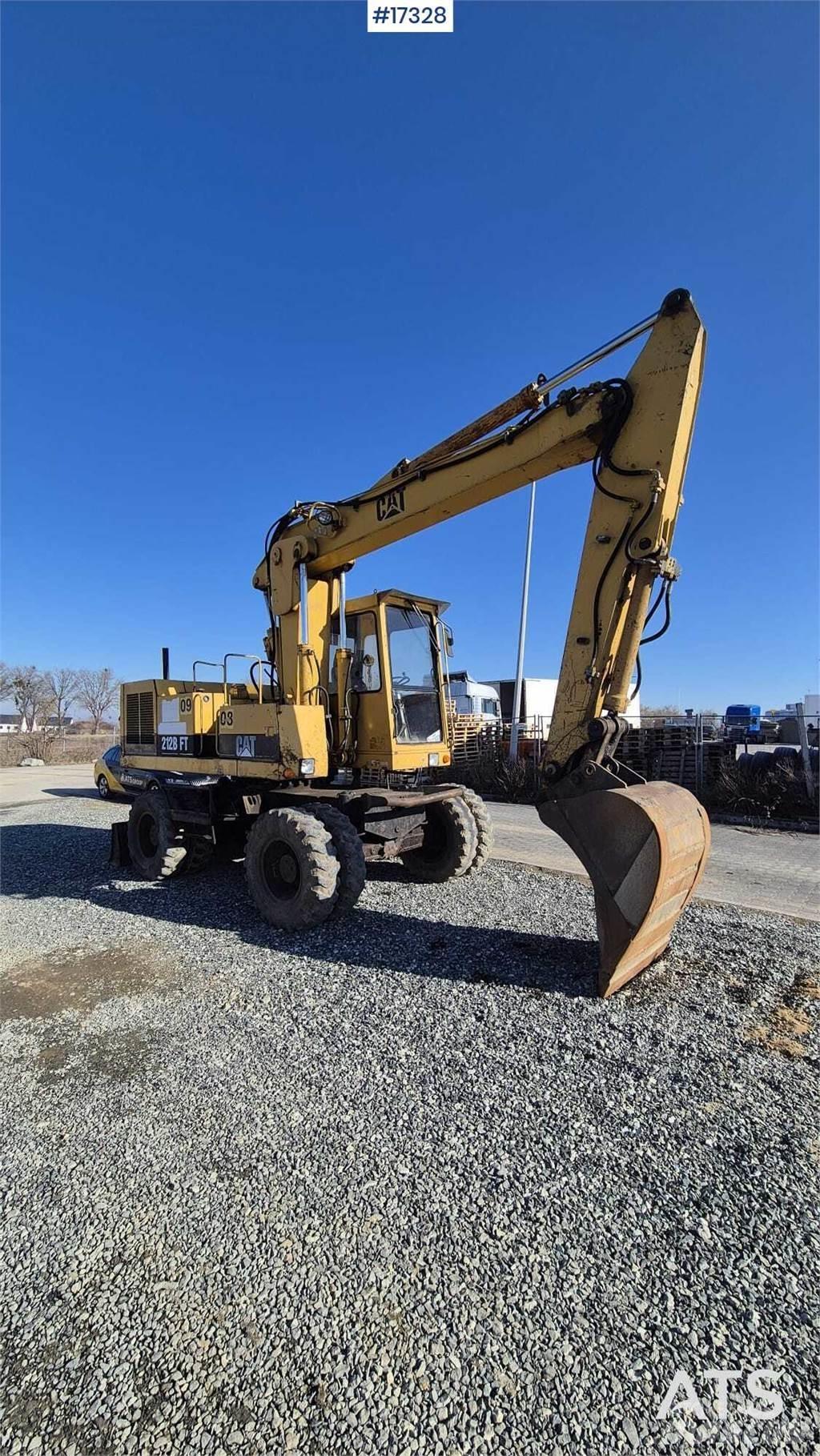 CAT 212BFT Колісні екскаватори