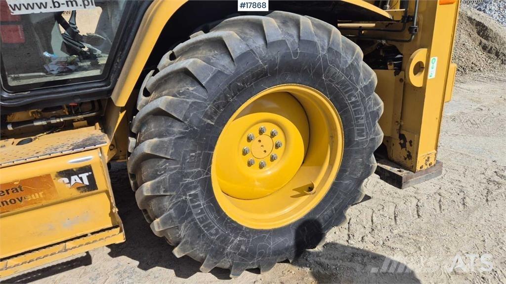 CAT 424D Екскаватори-навантажувачі