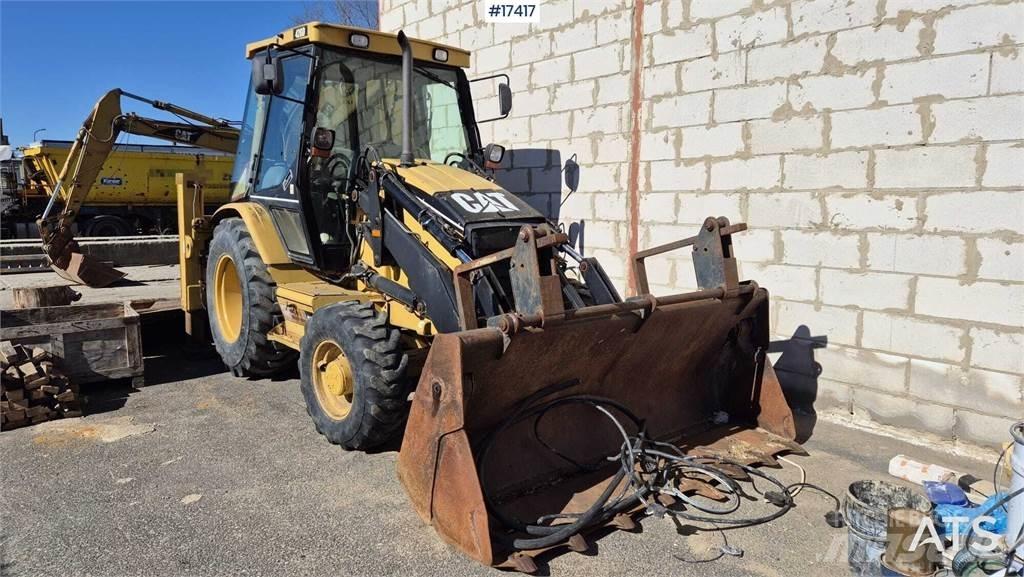 CAT 428D Екскаватори-навантажувачі