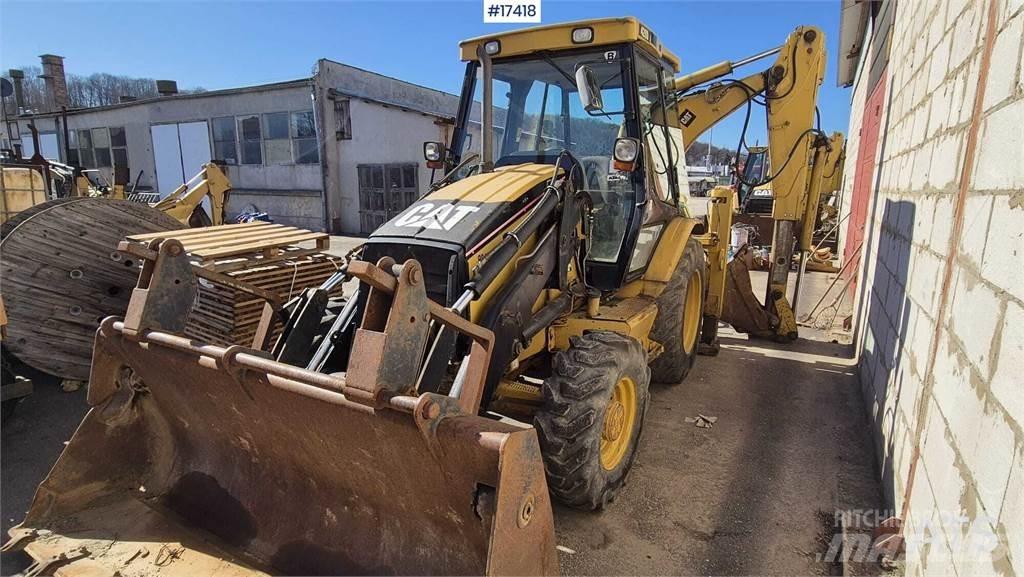 CAT 428D Екскаватори-навантажувачі