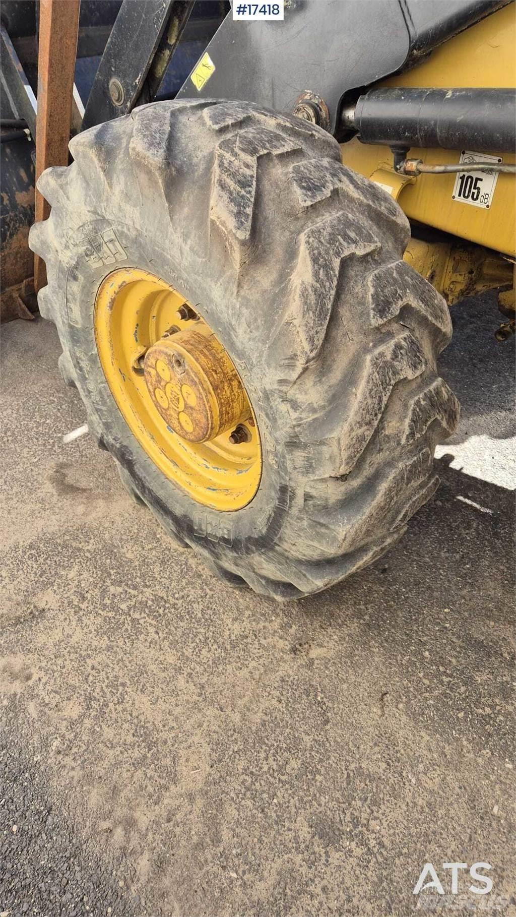 CAT 428D Екскаватори-навантажувачі