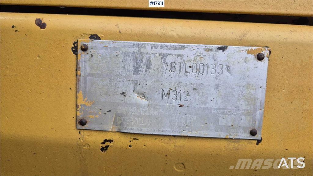 CAT M312 Колісні екскаватори