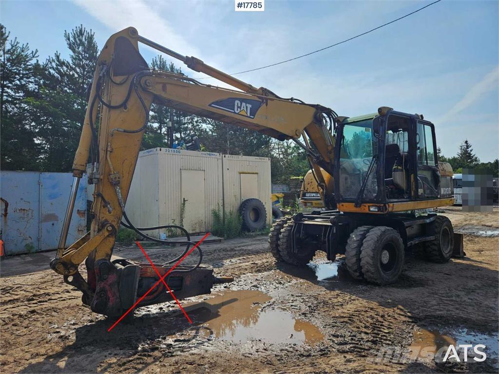 CAT M313 C Колісні екскаватори