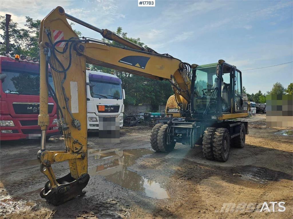 CAT M315C Колісні екскаватори