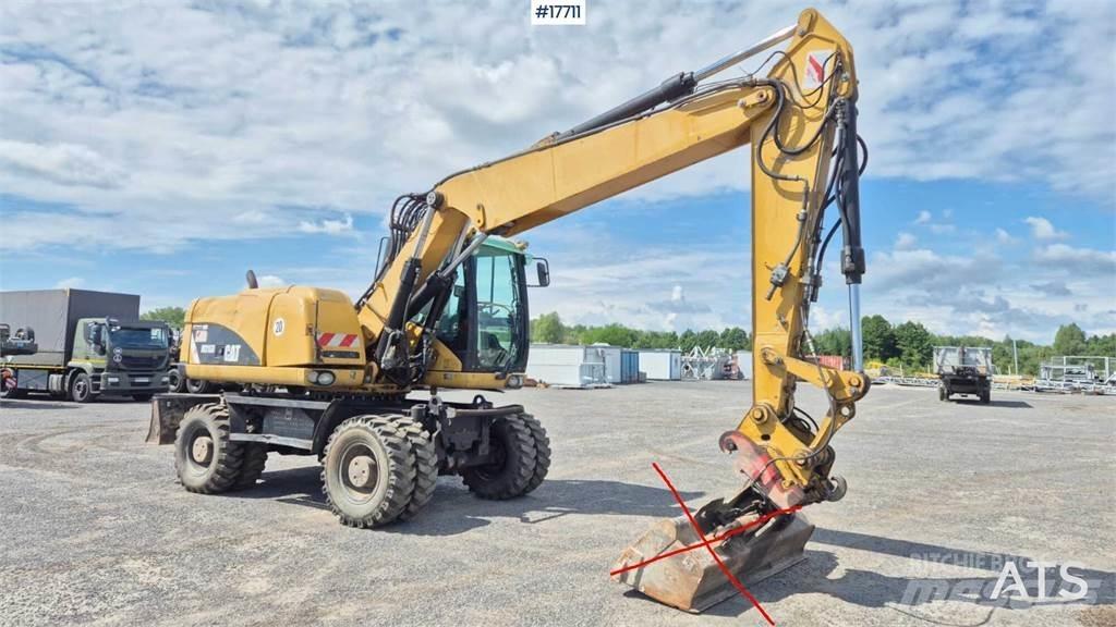 CAT M316D Колісні екскаватори