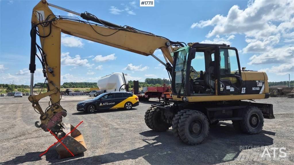 CAT M316D Колісні екскаватори