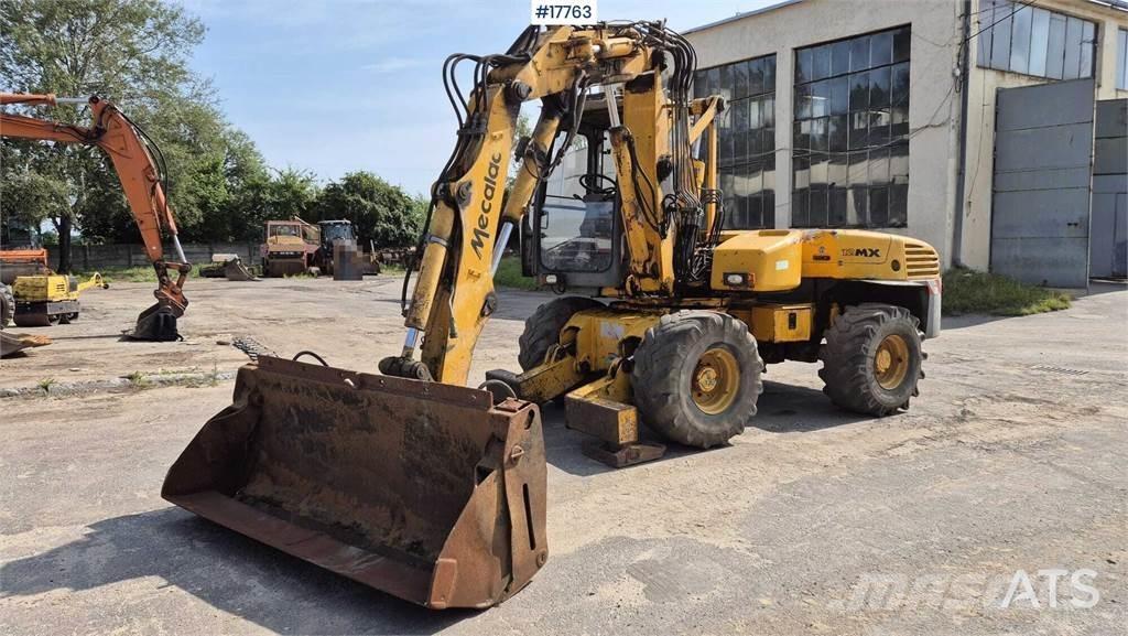Mecalac 12MX Колісні екскаватори