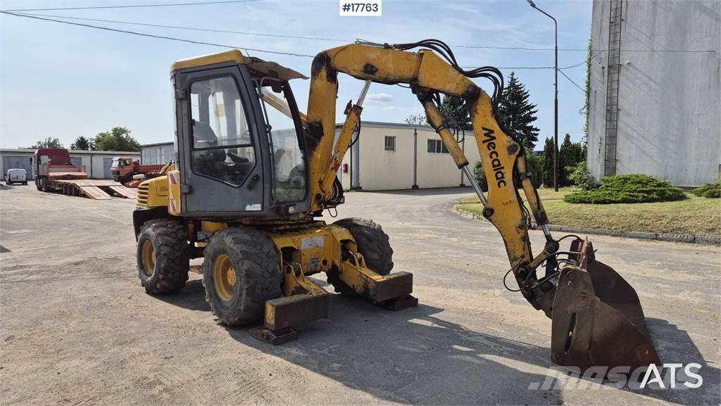 Mecalac 12MX Колісні екскаватори