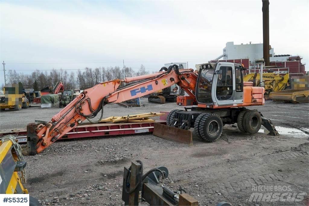Hitachi EX165W Колісні екскаватори
