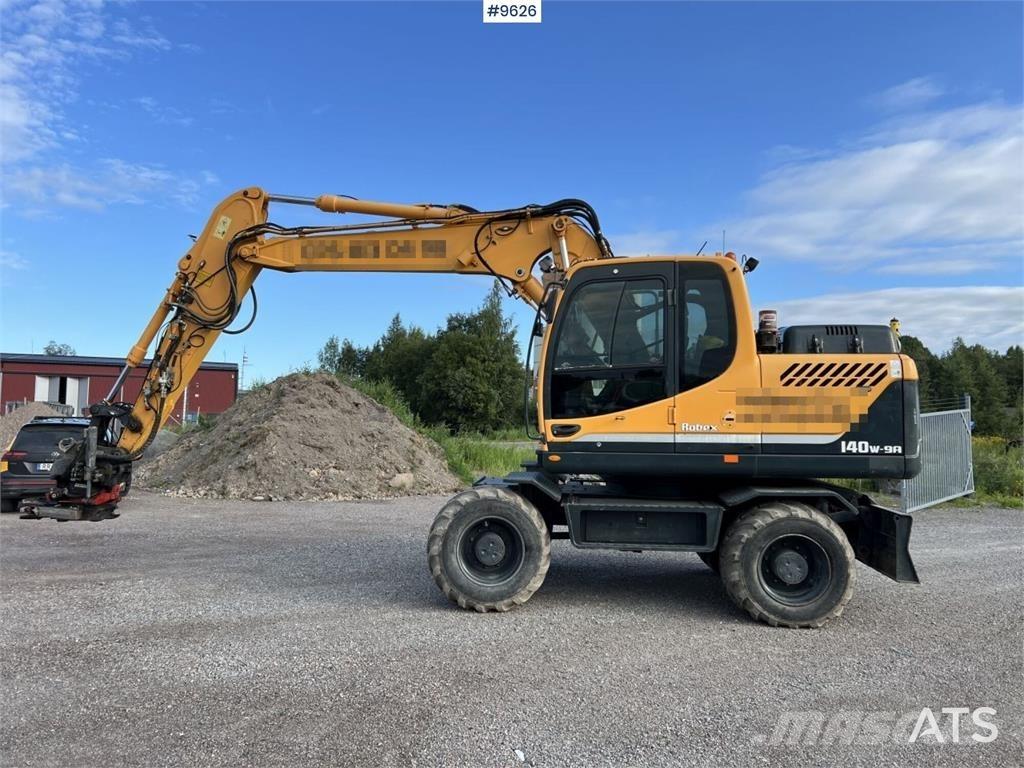 Hyundai 140W-9A Колісні екскаватори