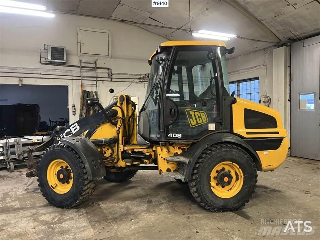 JCB 409 T4 Колісні бульдозери