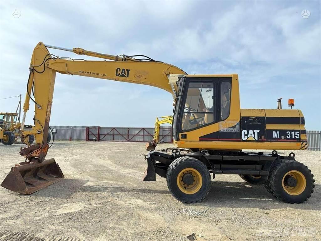 CAT M 315 Колісні екскаватори