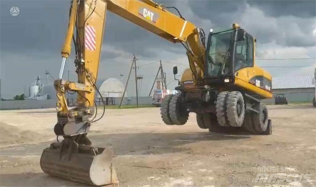 CAT M315C Колісні екскаватори