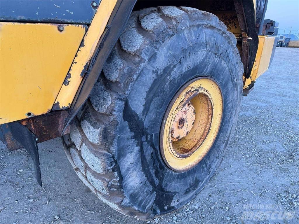 Komatsu HM 400-2 Зчленовані самоскиди