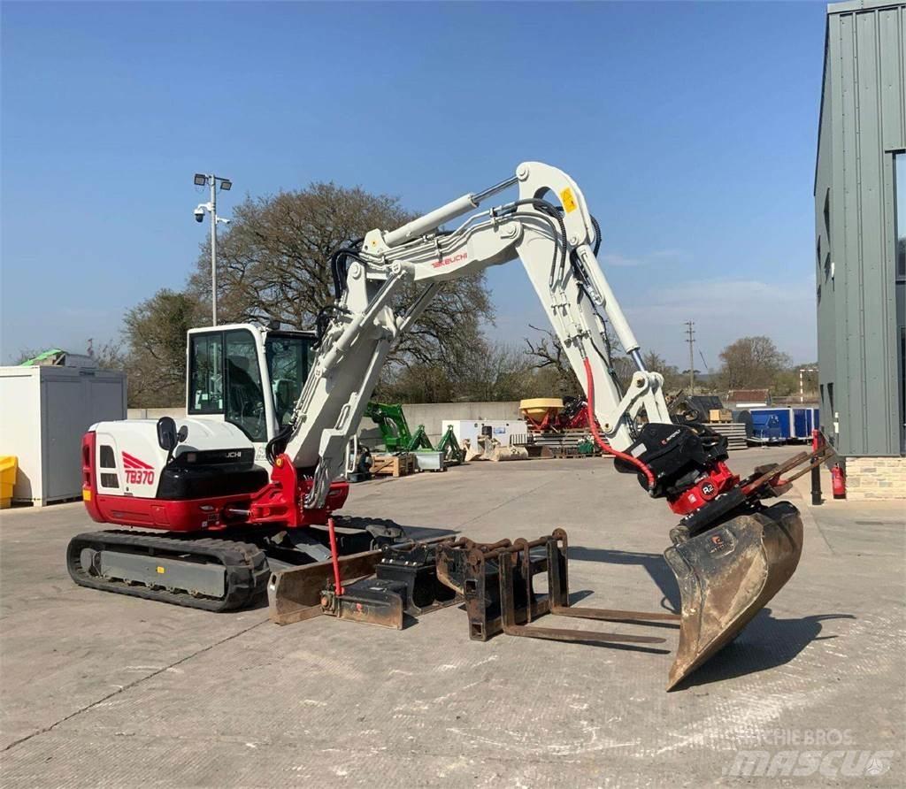Takeuchi TB370 Гусеничні екскаватори