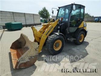 Komatsu 65 Фронтальні навантажувачі