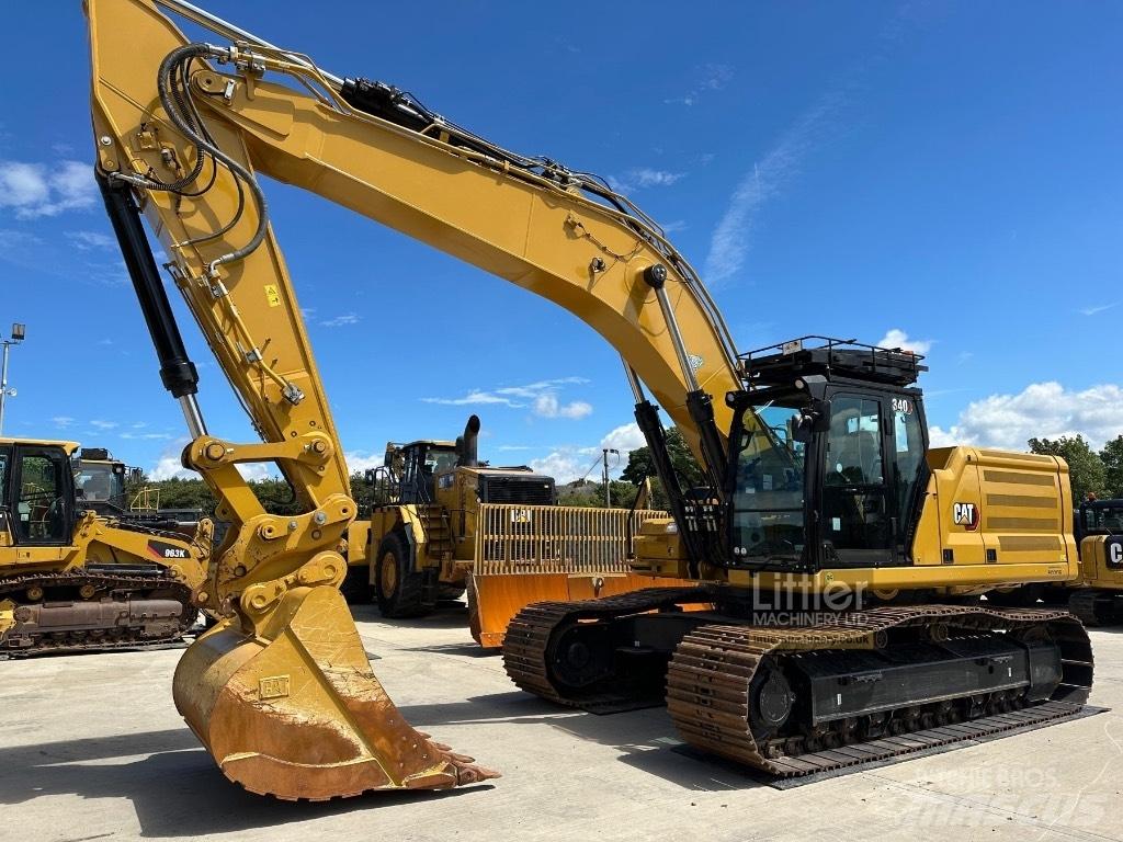 CAT 340 Гусеничні екскаватори