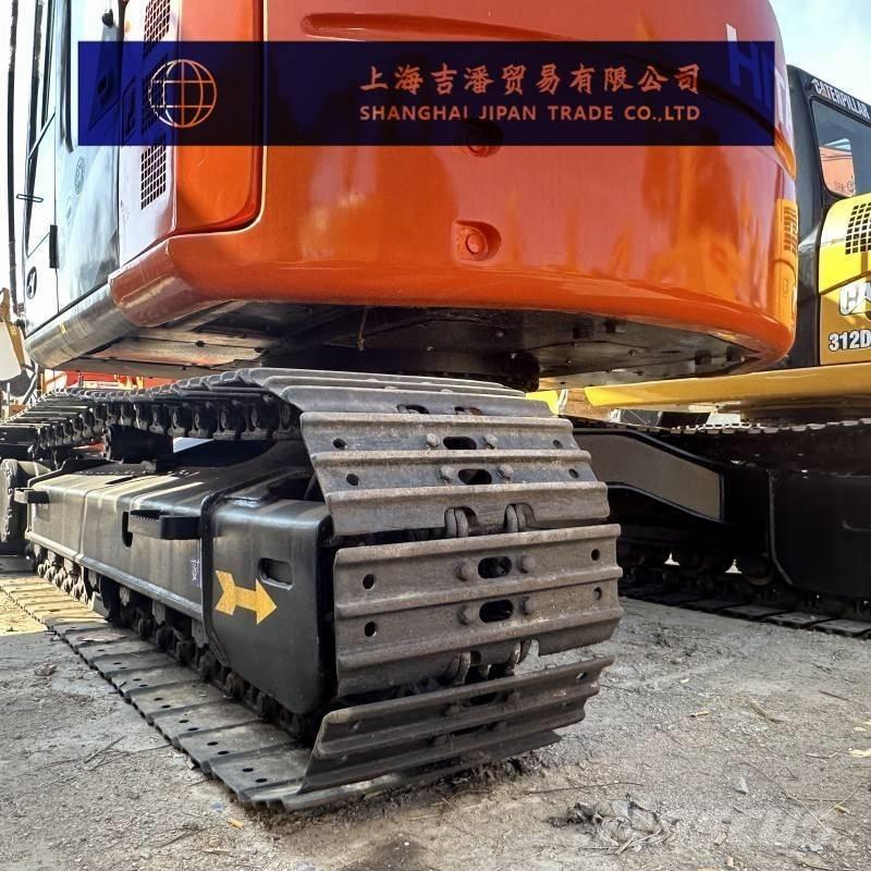 Hitachi ZX 135 Гусеничні екскаватори
