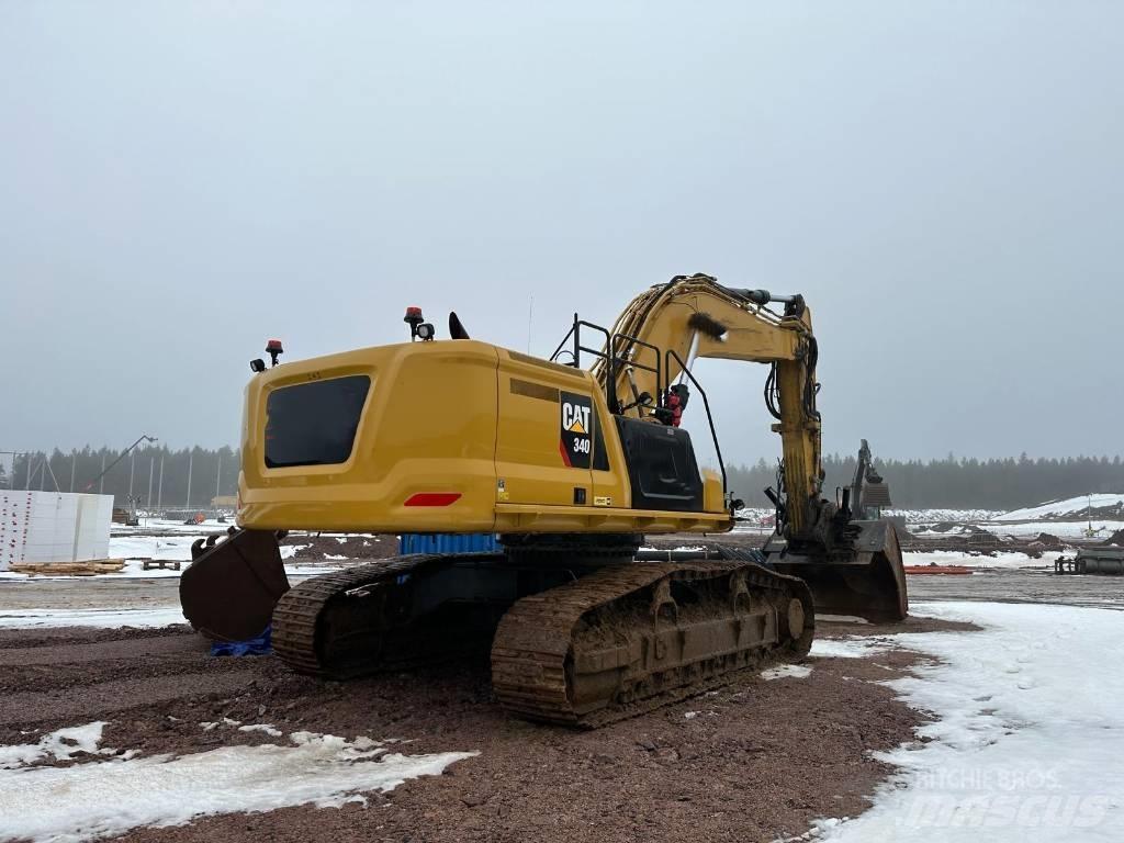 CAT 340 Гусеничні екскаватори