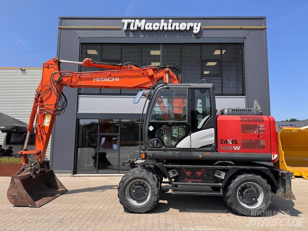 Hitachi 140W Колісні екскаватори