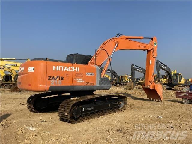 Hitachi ZX210 Гусеничні екскаватори