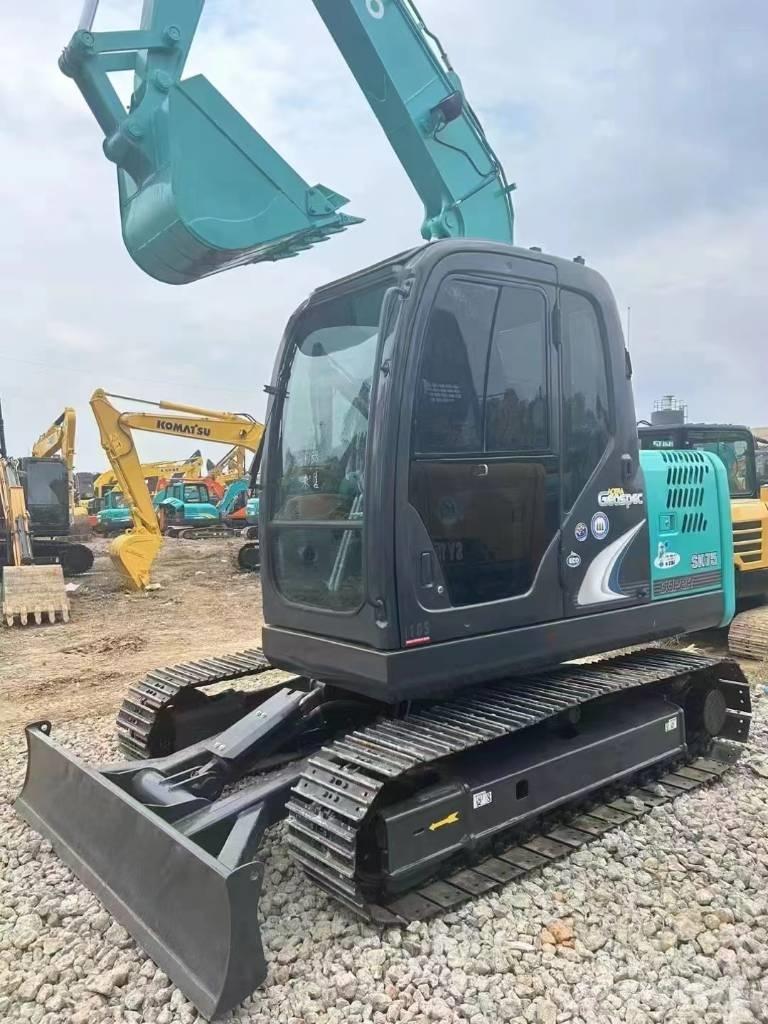 Kobelco SK 75 Середні екскаватори 7т. - 12т.