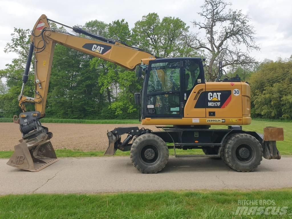 CAT M 317 F Колісні екскаватори