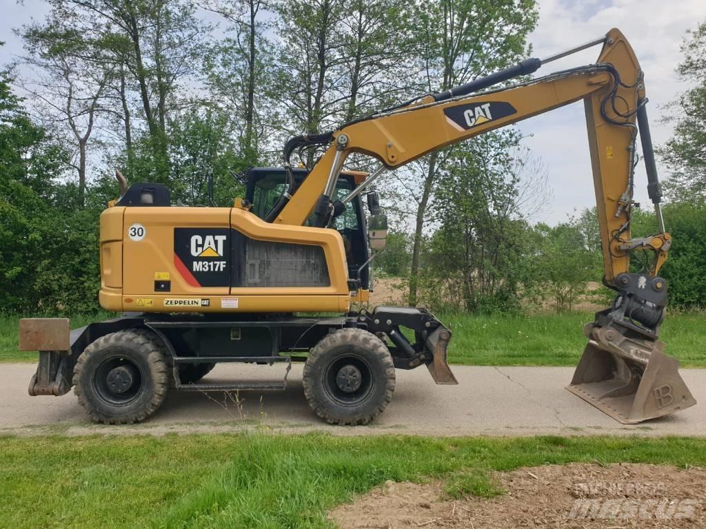CAT M 317 F Колісні екскаватори