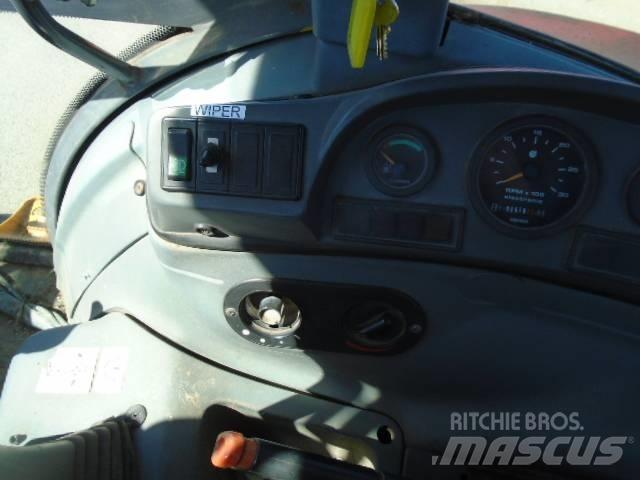 New Holland 575 E Екскаватори-навантажувачі