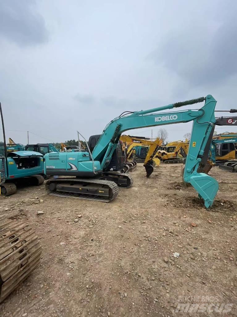 Kobelco SK140 Гусеничні екскаватори