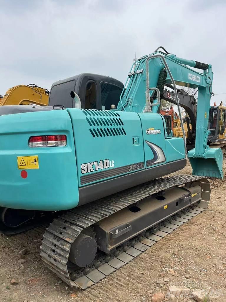 Kobelco SK140 Гусеничні екскаватори