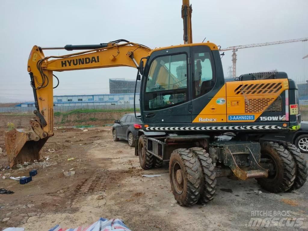 Hyundai 210W Колісні екскаватори