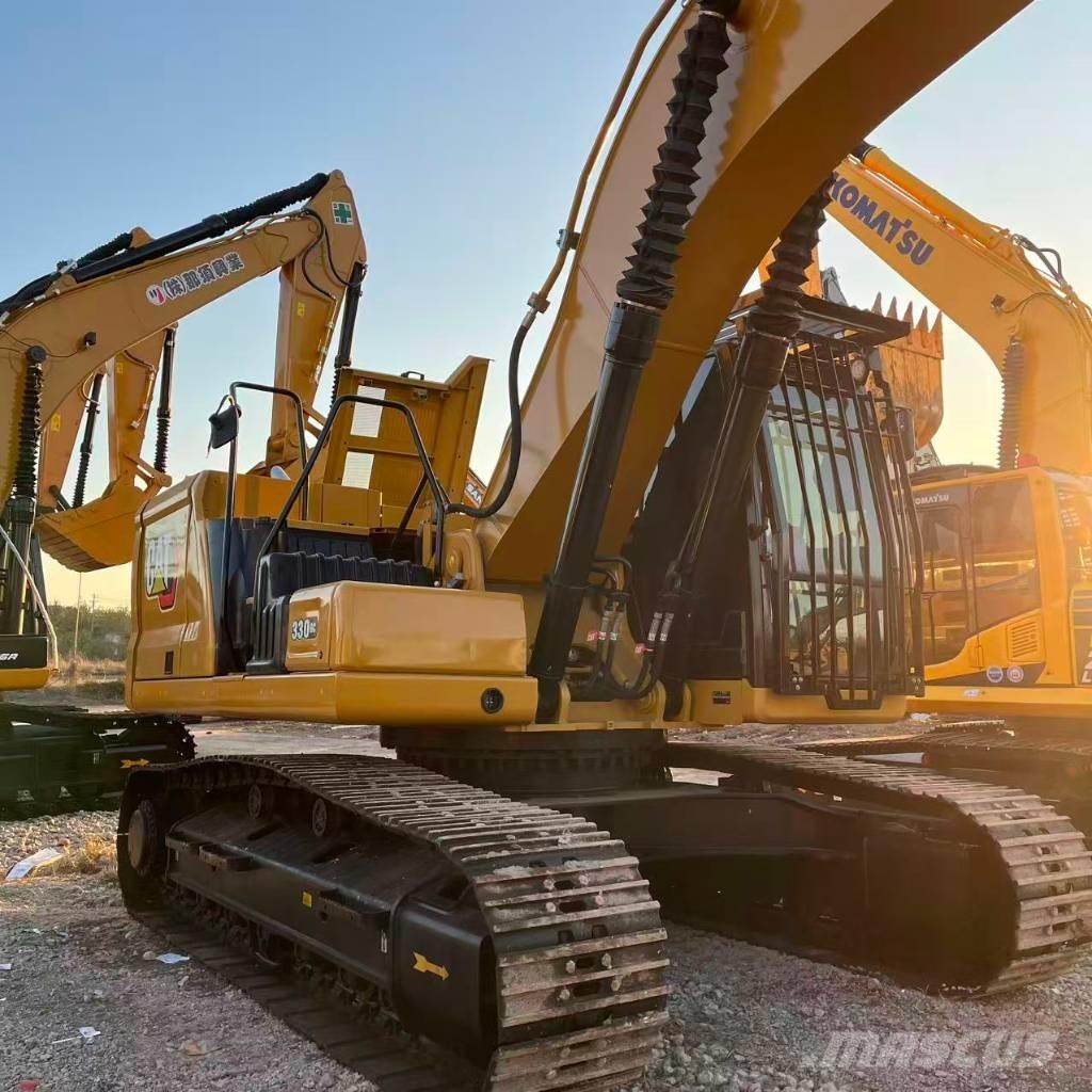 CAT 330 Гусеничні екскаватори