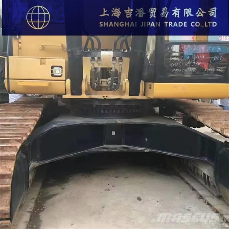 CAT 345 Гусеничні екскаватори