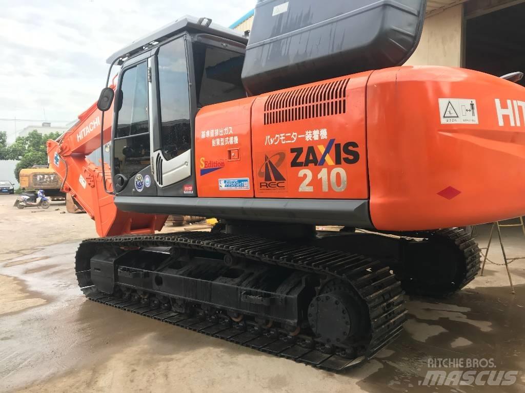 Hitachi ZX 210 Гусеничні екскаватори