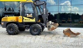 Mecalac 12 M TX Екскаватори-навантажувачі