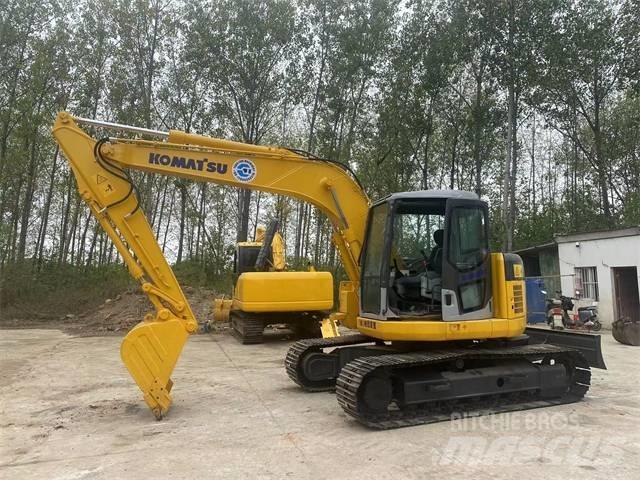 Komatsu PC128US Гусеничні екскаватори