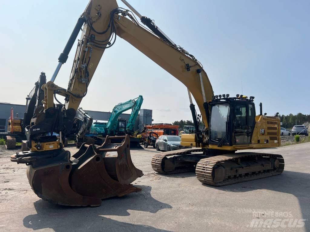 CAT 330 Гусеничні екскаватори