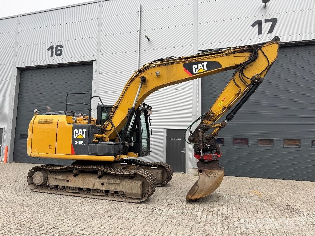 CAT 318 E L Гусеничні екскаватори