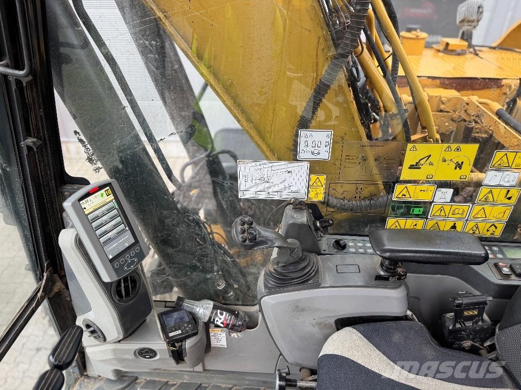 CAT 318 E L Гусеничні екскаватори