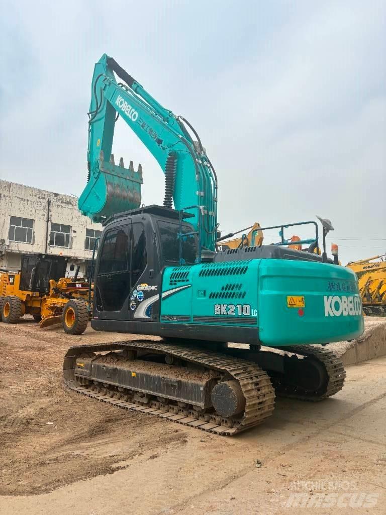 Kobelco SK 210 Гусеничні екскаватори
