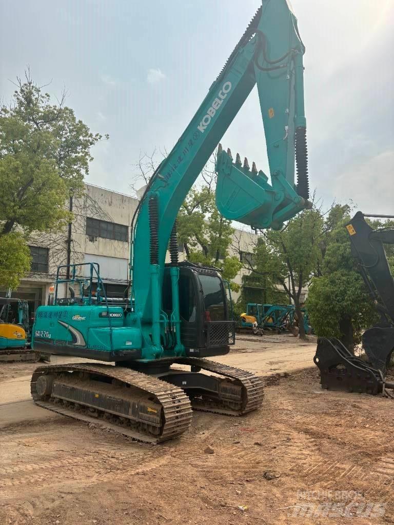 Kobelco SK 210 Гусеничні екскаватори