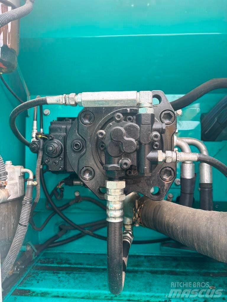 Kobelco SK 210 Гусеничні екскаватори