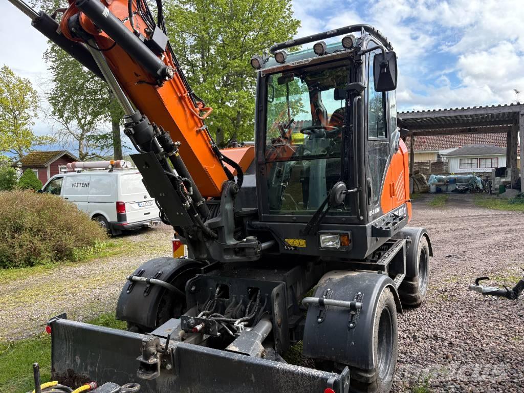 Develon DX 100 W-7 Колісні екскаватори