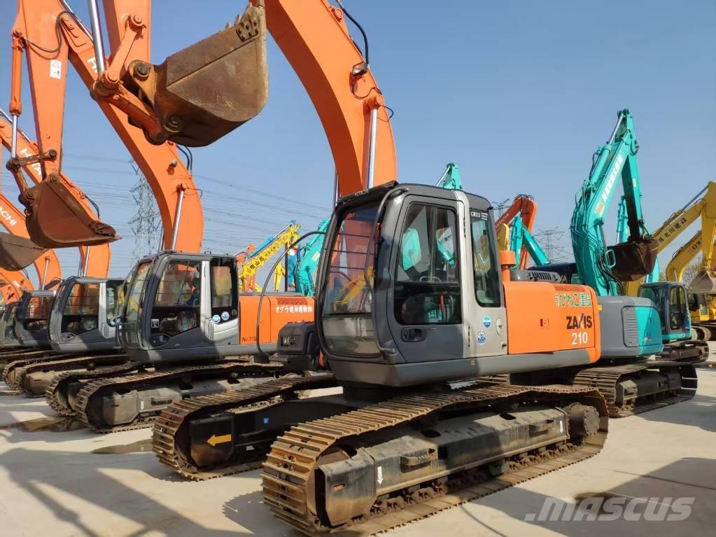 Hitachi Zaxis 210 Гусеничні екскаватори