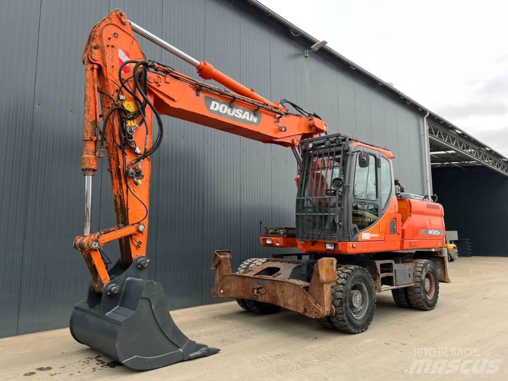 Doosan DX210W Колісні екскаватори