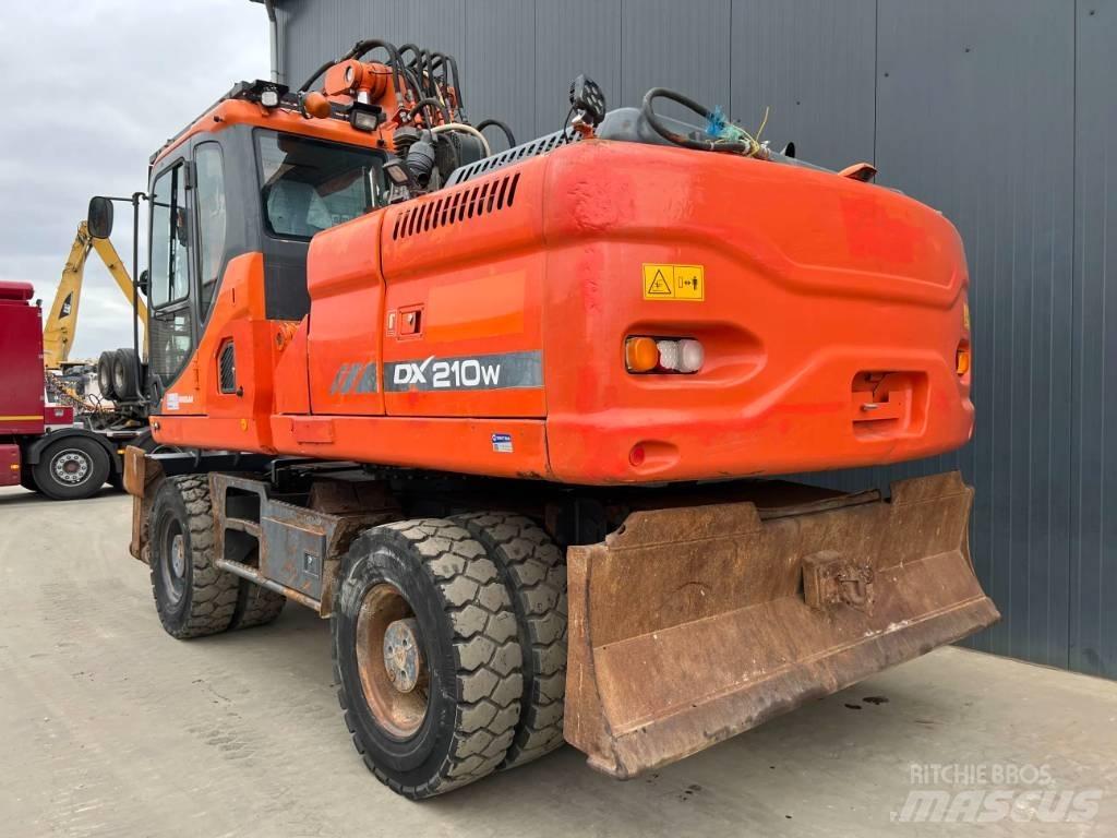 Doosan DX210W Колісні екскаватори
