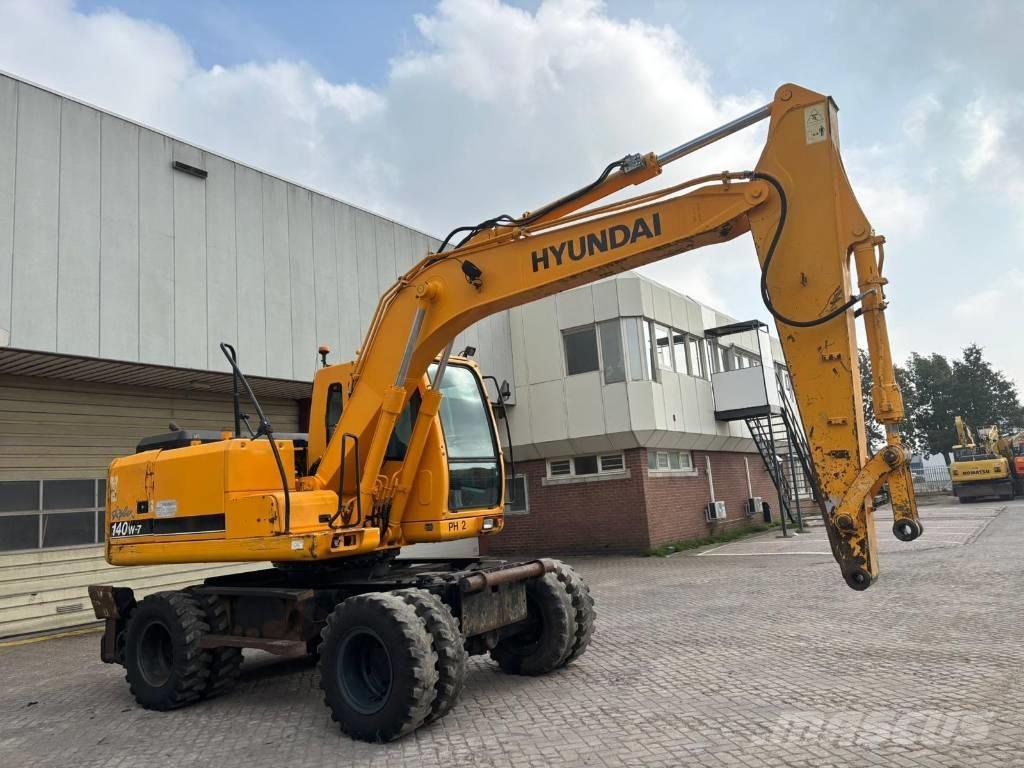 Hyundai 140W-7 Колісні екскаватори