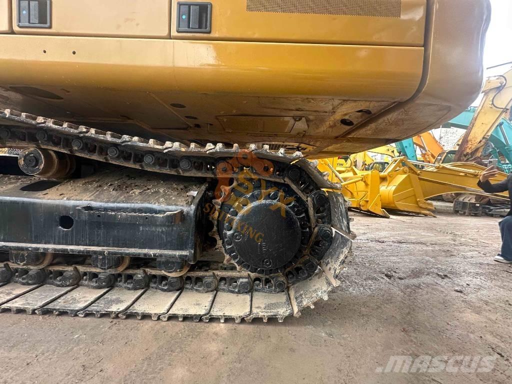 CAT 330 Гусеничні екскаватори